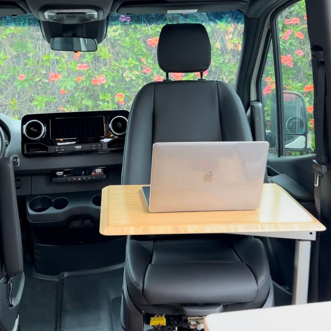 Interior of a campervan with a table attached using the S-Table Bracket